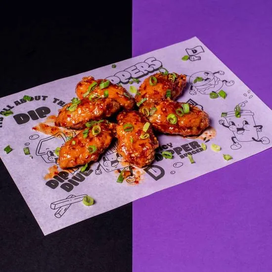 Glazed chicken wings on Dippers paper